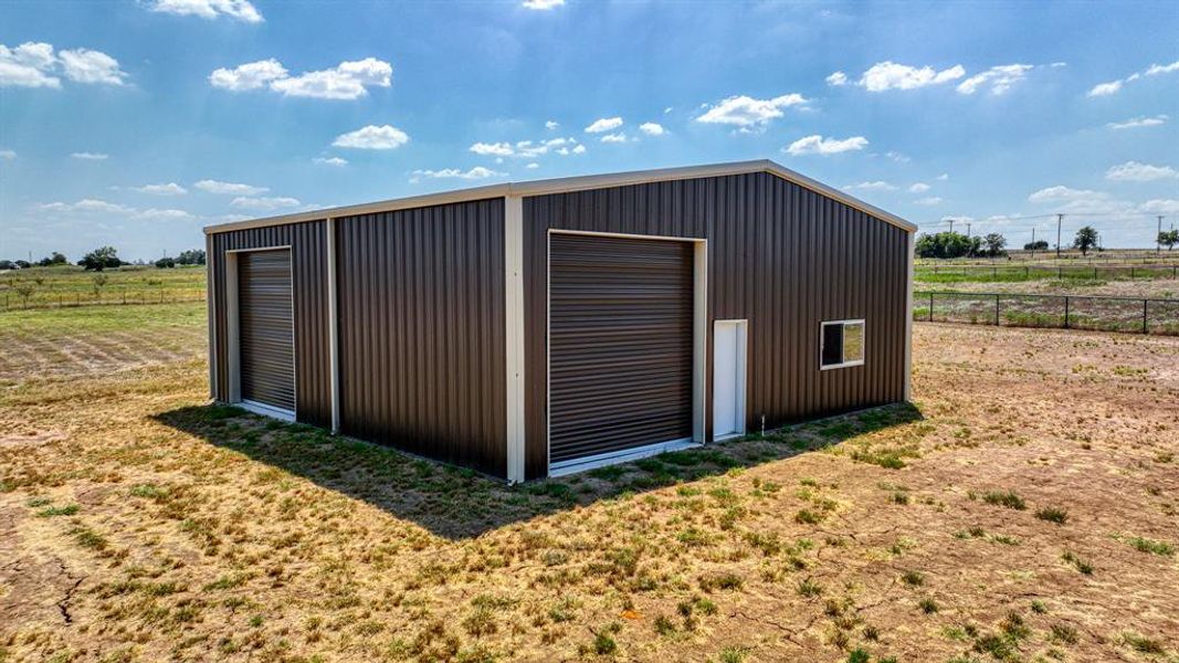 Brand NEW Insulated Shop Building with 2 Rollup Doors and Electric