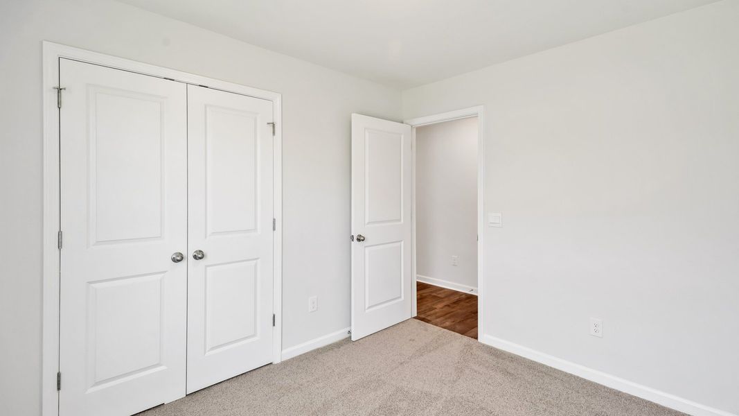 Spacious, unfurnished interior of a new home in Lockwood Landing, Supply (Image 16). Spacious, unfurnished interior of a new home in Lockwood Landing, Supply (Image 16).