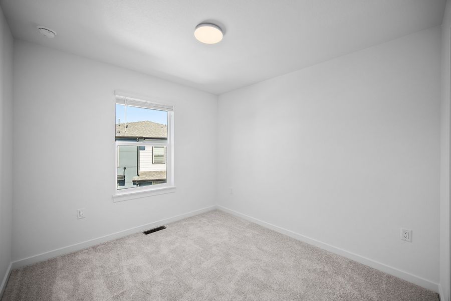Spacious, unfurnished interior of a new home in Lyric at RidgeGate Townhomes, Lone Tree (Image 23).