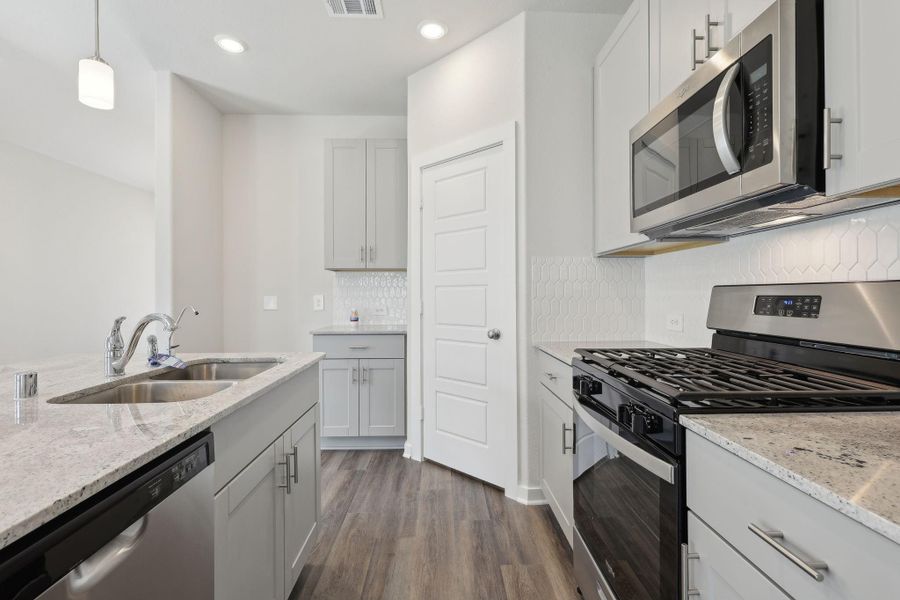 Photo is not of the actual home, but is an inspirational photo of builder’s model home and may depict options, furnishings, and/or decorator features that are not included