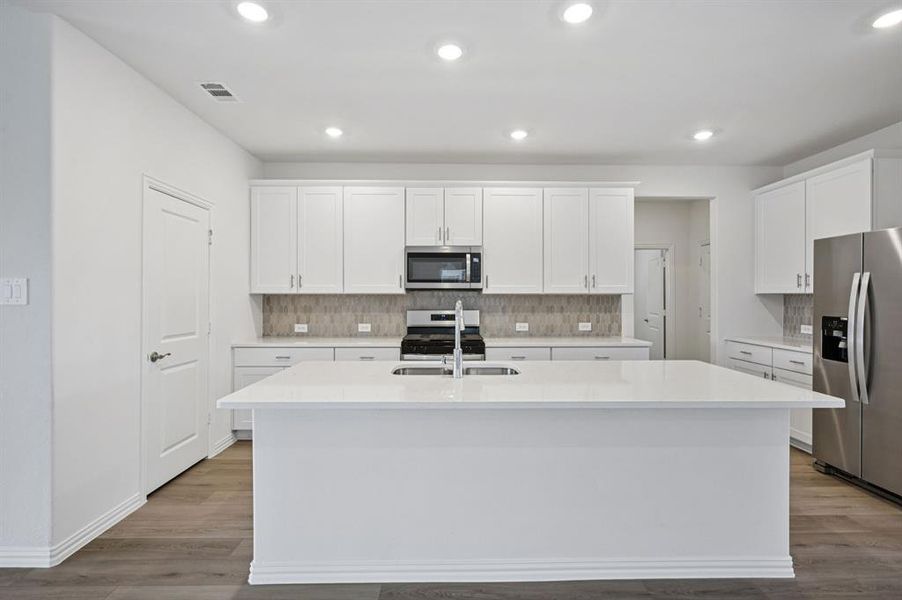 Photo is not of the actual home, but is an inspirational photo of builder’s model home and may depict options, furnishings, and/or decorator features that are not included.