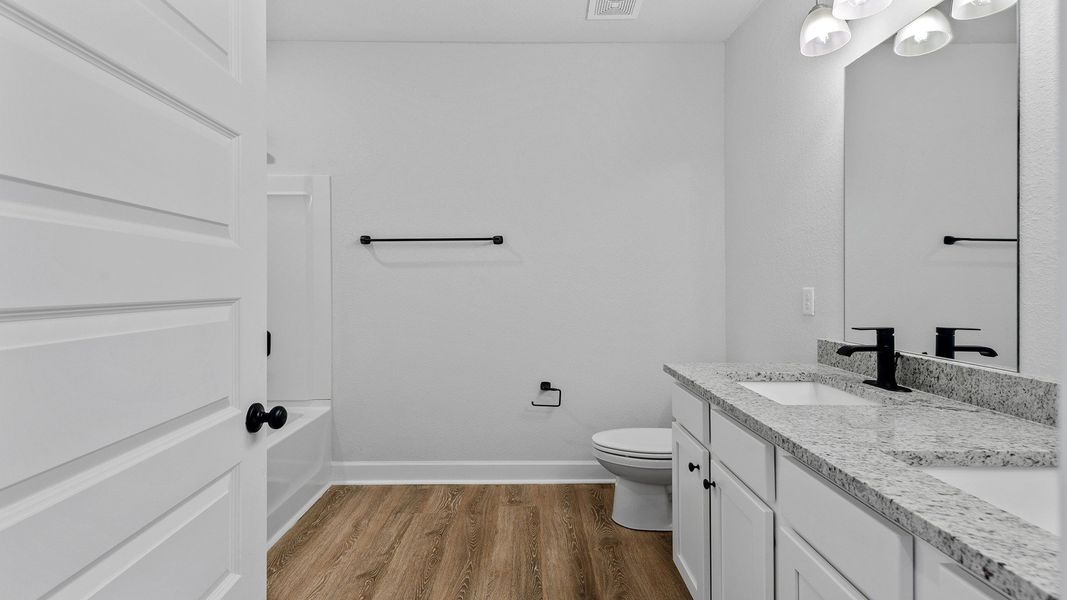 Representative furnished interior of a home built from the The Jasmine by D.R. Horton in Meadows at Rehwinkel, Crawfordville (Image 5).