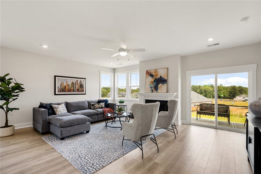 A comforting living room offers light-toned floori A comforting living room offers light-toned floori