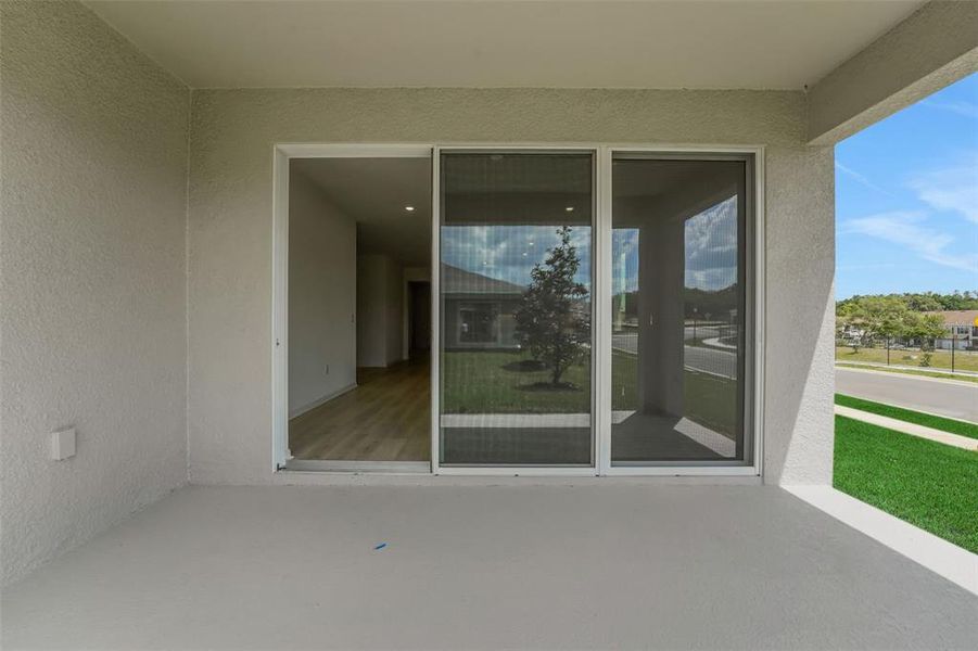 Exterior details and patio area of a home in Tuscan Hills, Dade City (Image 29).