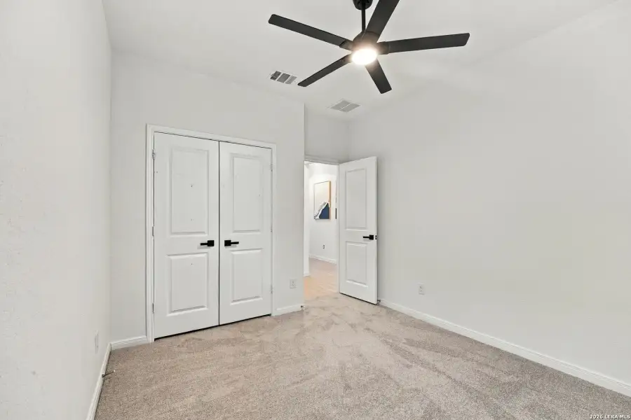 Spacious, unfurnished interior of a new home in Sage Meadows, St. Hedwig (Image 19).