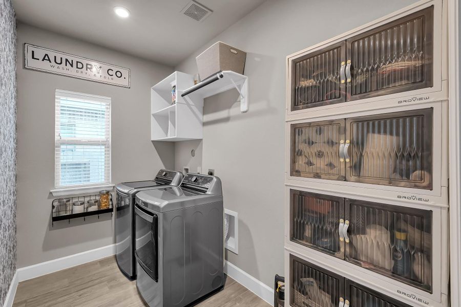 Furnished interior view inside a new home in Grand Central Park 45', Conroe (Image 33).