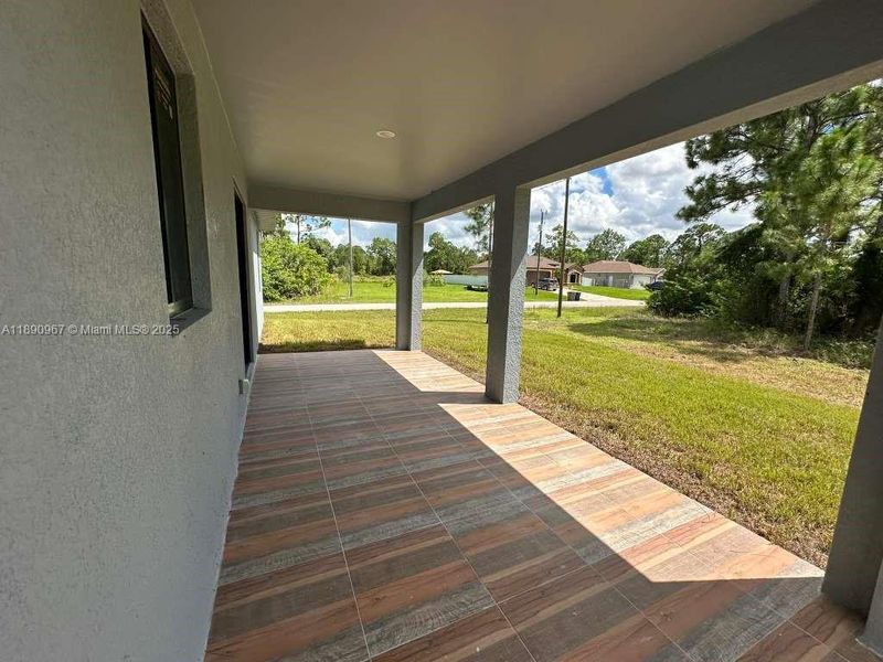 Exterior details and patio area of a home in , Lehigh Acres (Image 2). Exterior details and patio area of a home in , Lehigh Acres (Image 2).