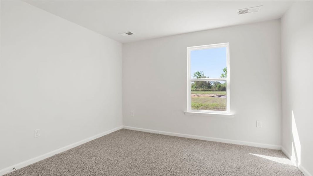 Spacious, unfurnished interior of a new home in Durbin Meadows Traditions, Fountain Inn (Image 24).