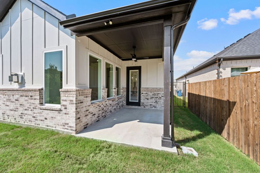 Exterior details and patio area of a home in Parks of Aledo, Aledo (Image 26).