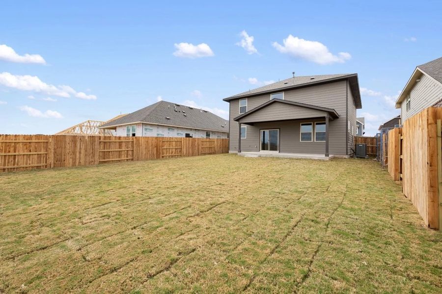 Exterior details and patio area of a home in Patterson Ranch, Georgetown (Image 25).