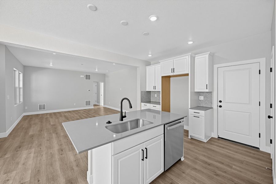 Furnished interior view inside a new home in Trailstone, Arvada (Image 4).