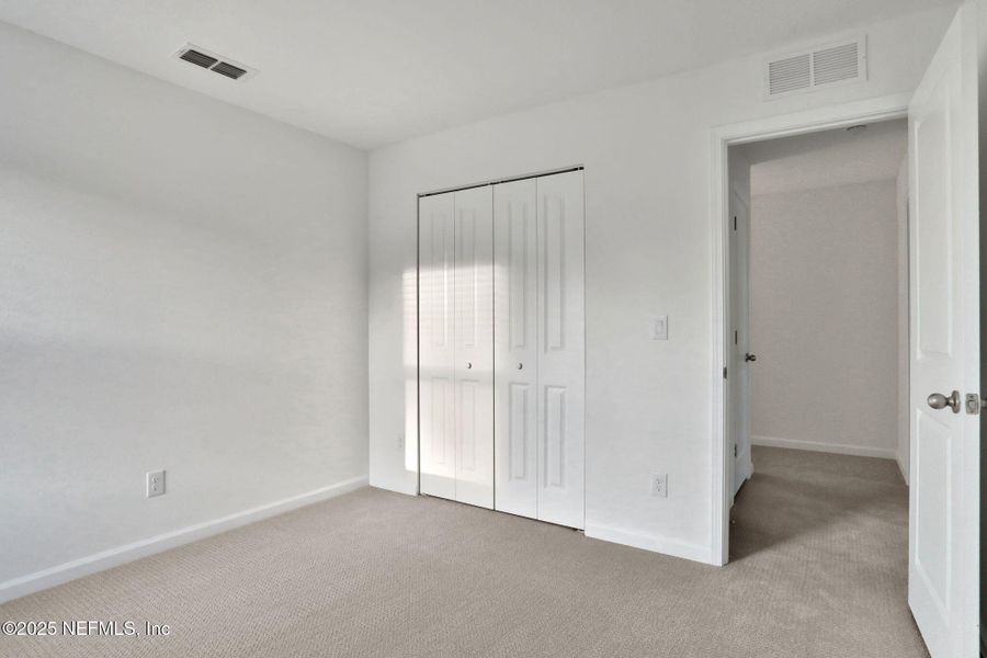 Spacious, unfurnished interior of a new home in Cordova Palms, St. Augustine (Image 18).