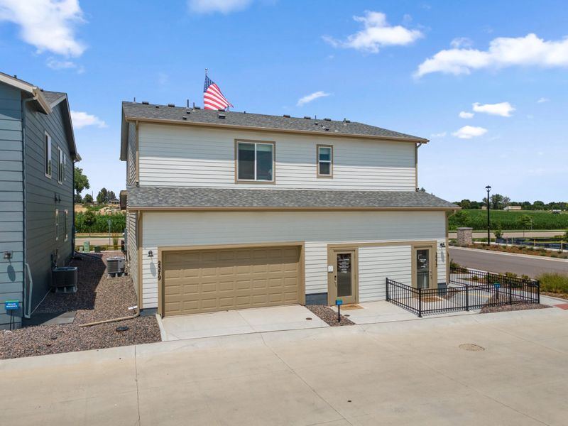 Representative exterior photo of a completed home built from the Denali by Landsea Homes in Pintail Commons at Johnstown Village, Johnstown, CO (Image 22).