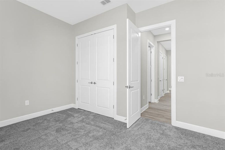 Spacious, unfurnished interior of a new home in Esplanade at Center Lake Ranch, St. Cloud (Image 14).