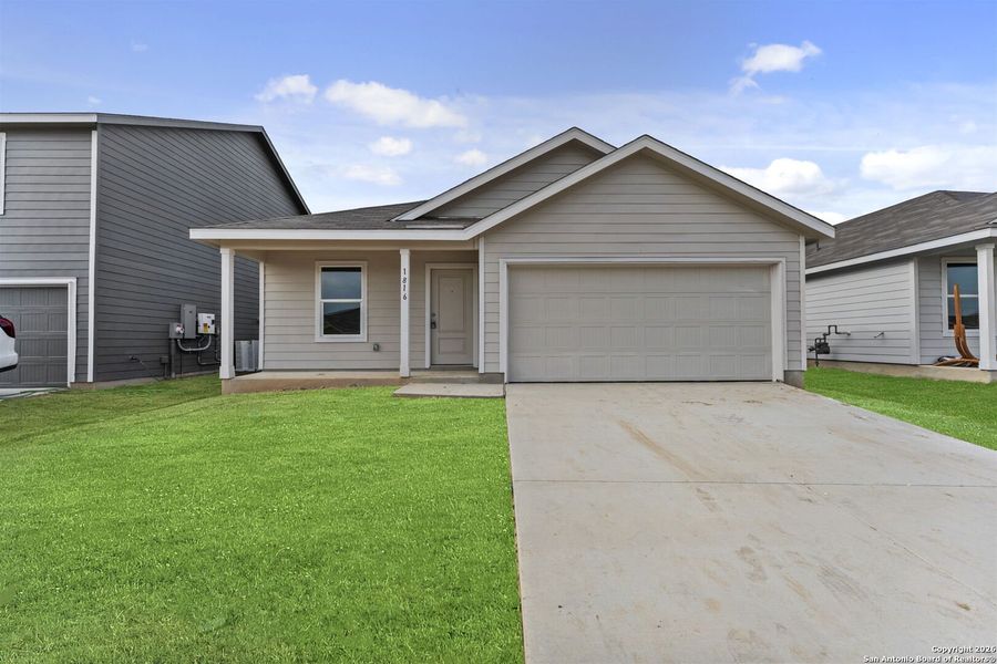 Front exterior of a new home in Voss Farms: Watermill Collection, New Braunfels, TX, highlighting curb appeal (Image 1). Front exterior of a new home in Voss Farms: Watermill Collection, New Braunfels, TX, highlighting curb appeal (Image 1).