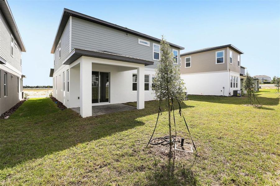 Exterior details and patio area of a home in Cyrene at Minneola, Minneola (Image 28).
