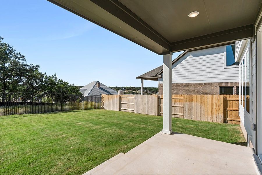 Exterior details and patio area of a home in Terrace Collection at Lariat, Liberty Hill (Image 23). Exterior details and patio area of a home in Terrace Collection at Lariat, Liberty Hill (Image 23).
