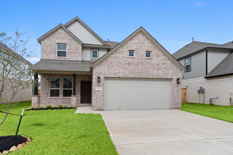 Front exterior of a new home in Huntington Place, Rosharon, TX, highlighting curb appeal (Image 2). Front exterior of a new home in Huntington Place, Rosharon, TX, highlighting curb appeal (Image 2).