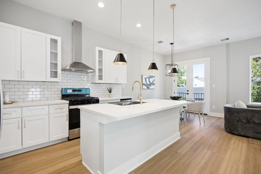 Large island with knee space for breakfast bar Large island with knee space for breakfast bar