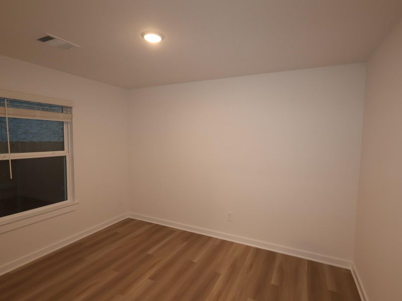 Spacious, unfurnished interior of a new home in Wildrye, Waller (Image 27).