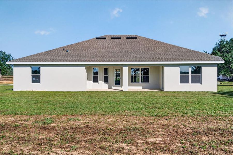 Exterior details and patio area of a home in Hill Country Estates, Dade City (Image 40).