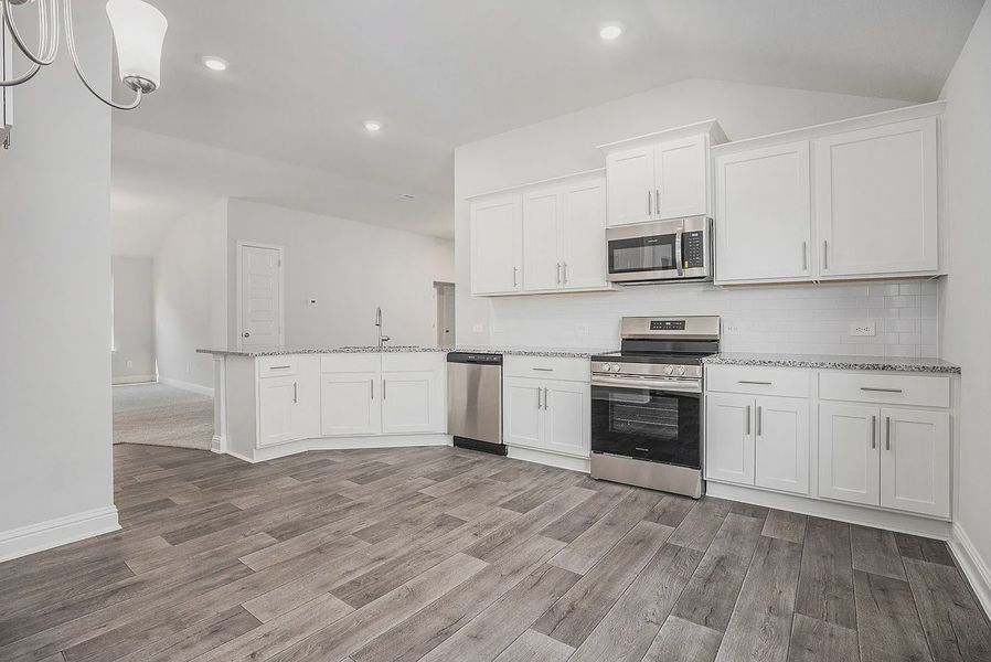 Furnished interior view inside a new home in Kiber Reserve, Angleton (Image 4).
