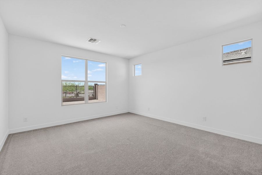 Spacious, unfurnished interior of a new home in Artisan at Asante, Surprise (Image 23).
