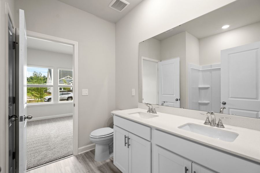 Furnished interior view inside a new home in Cypress Ridge - The Coastline Series, Longs (Image 13).