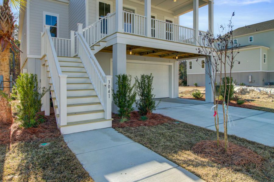 Exterior details and patio area of a home in Indigo Grove Single Family Homes, Johns Island (Image 28).