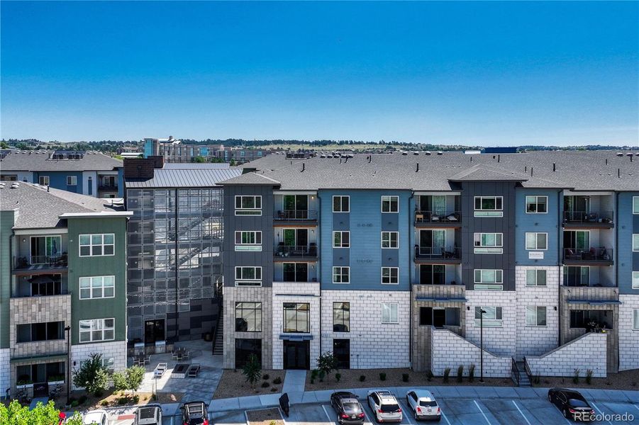 Front exterior of a new home in The Trails at Westcreek, Parker, CO, highlighting curb appeal (Image 2).