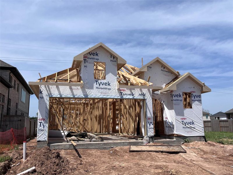 Front exterior of a new home in Sienna 40', Missouri City, TX, highlighting curb appeal (Image 18). Front exterior of a new home in Sienna 40', Missouri City, TX, highlighting curb appeal (Image 18).