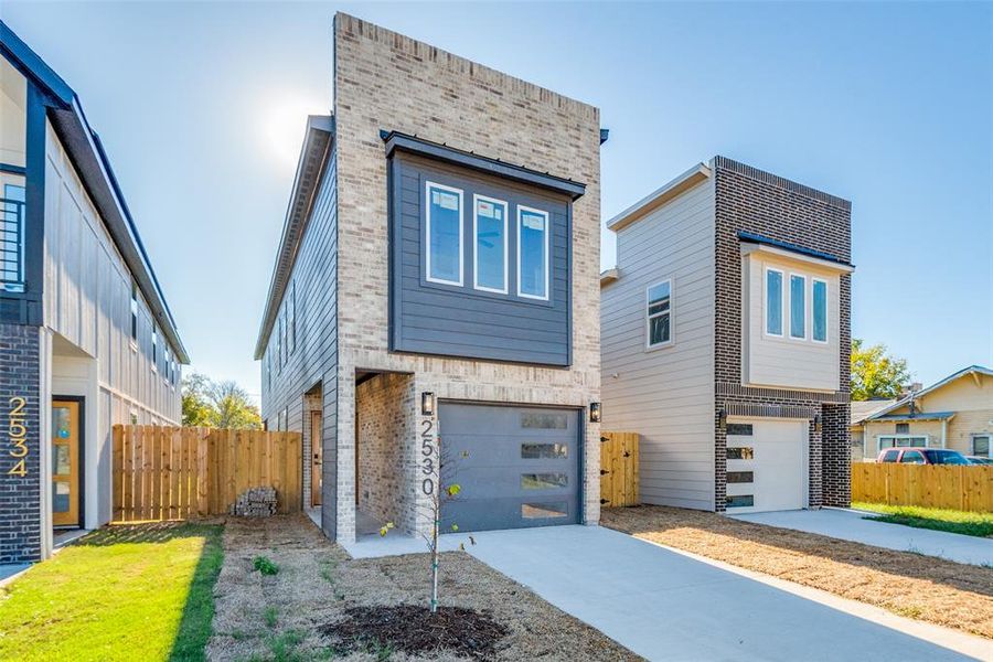 Contemporary house featuring a garage