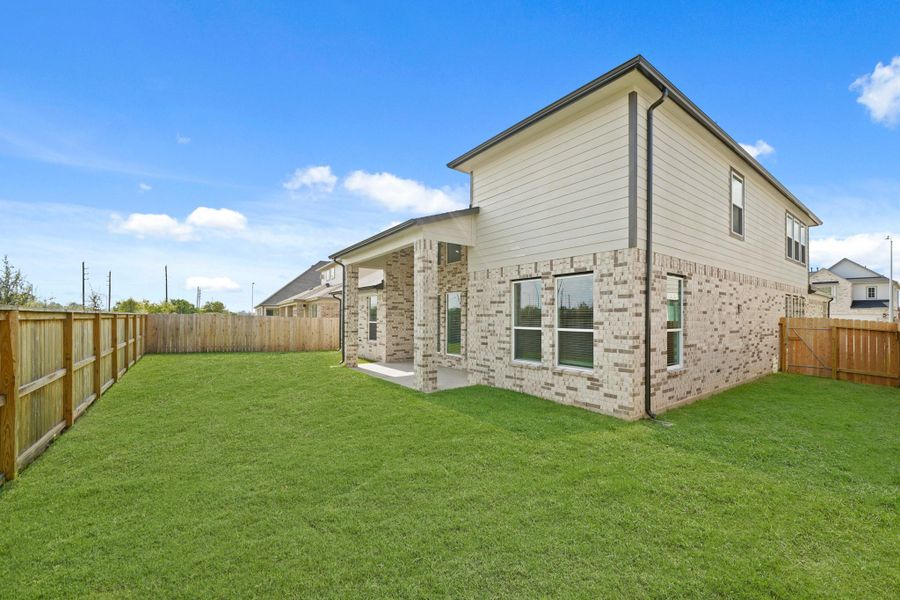 Exterior details and patio area of a home in Morton Creek Ranch, Katy (Image 4). Exterior details and patio area of a home in Morton Creek Ranch, Katy (Image 4).