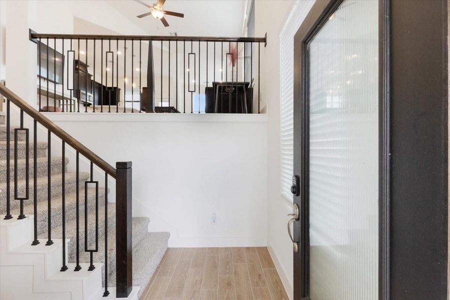 Furnished interior view inside a new home in Meridiana, Iowa Colony (Image 6).