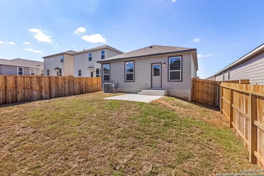Exterior details and patio area of a home in Knox Ridge, Converse (Image 2). Exterior details and patio area of a home in Knox Ridge, Converse (Image 2).