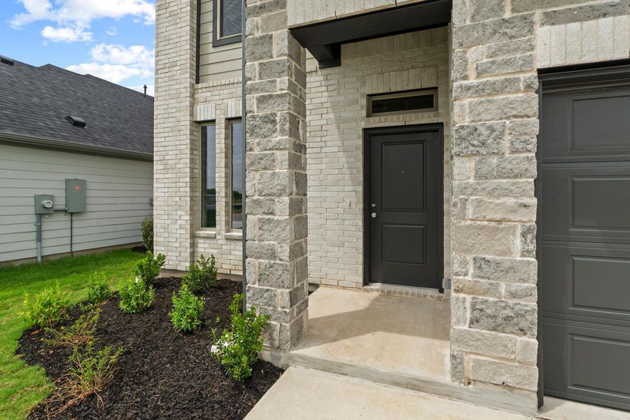Exterior details and patio area of a home in Prairie Winds, Hutto (Image 2). Exterior details and patio area of a home in Prairie Winds, Hutto (Image 2).