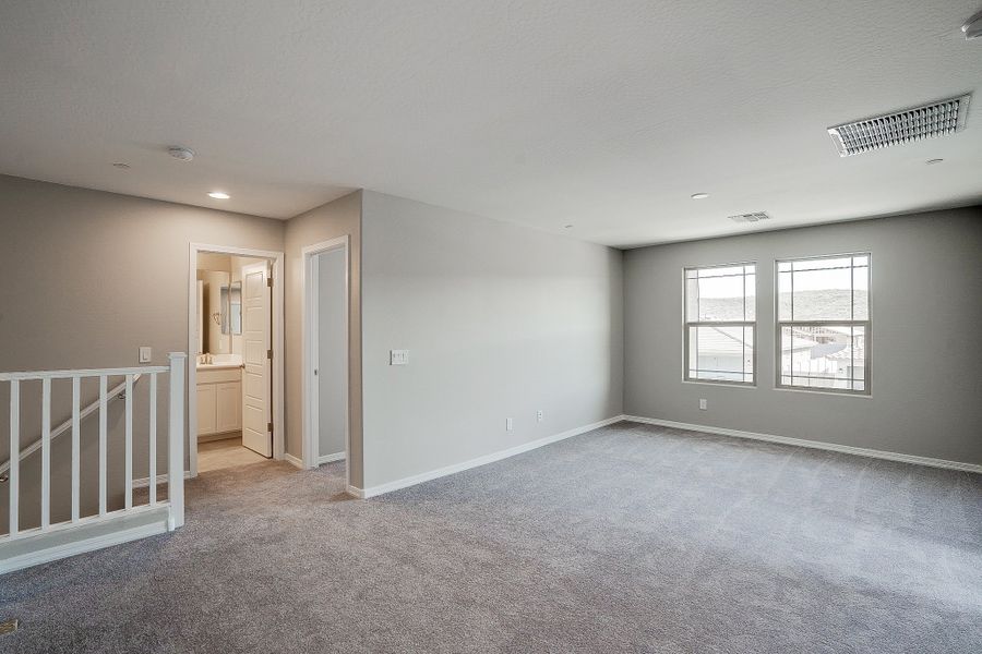 Representative unfurnished interior of a home built from the Castillo Series - Lavender by Brightland Homes in Castillo at Anderson Parc, Buckeye (Image 18). Representative unfurnished interior of a home built from the Castillo Series - Lavender by Brightland Homes in Castillo at Anderson Parc, Buckeye (Image 18).