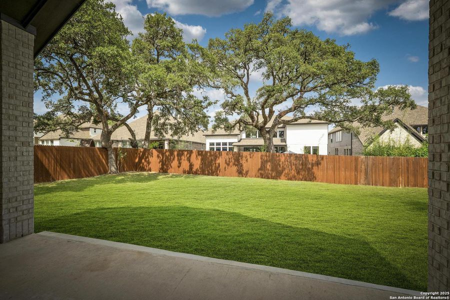 Exterior details and patio area of a home in Balcones Creek 70', Boerne (Image 25).