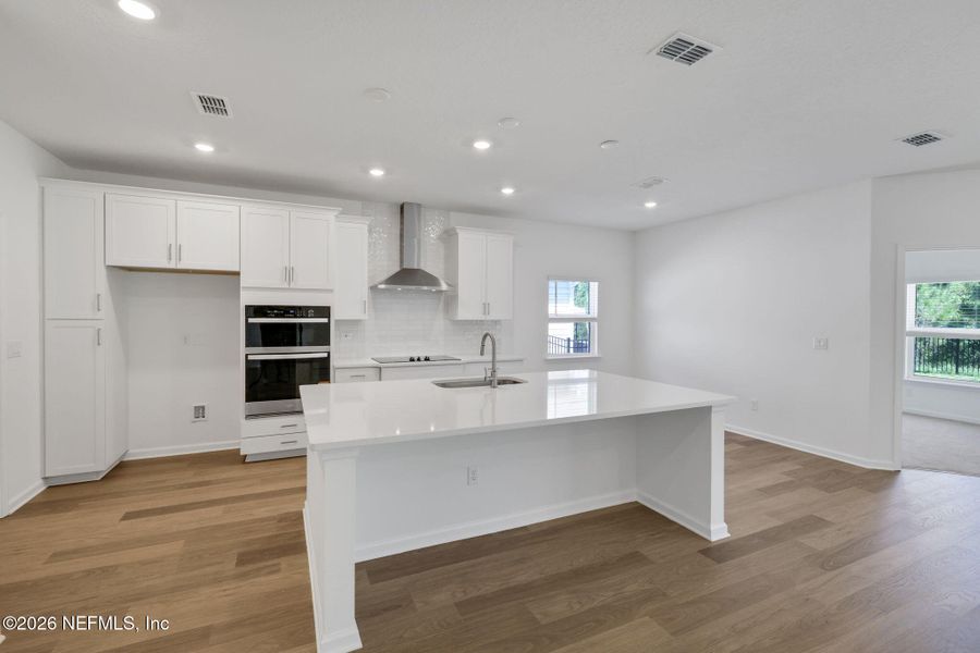 Furnished interior view inside a new home in Hyland Trail, Green Cove Springs (Image 7).