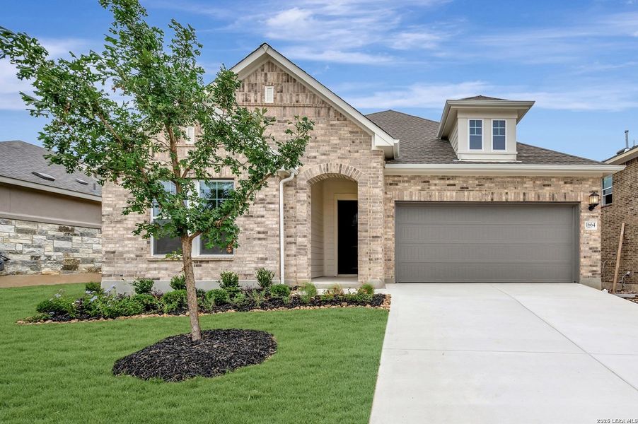 Front exterior of a new home in Meyer Ranch – Select Reserve Series, New Braunfels, TX, highlighting curb appeal (Image 15). Front exterior of a new home in Meyer Ranch – Select Reserve Series, New Braunfels, TX, highlighting curb appeal (Image 15).