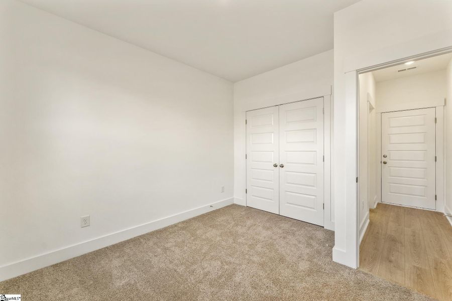 Spacious, unfurnished interior of a new home in Renaissance Place, Greenville (Image 13).