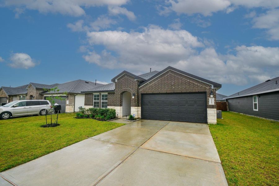 Front exterior of a new home in , Rosharon, TX, highlighting curb appeal (Image 16). Front exterior of a new home in , Rosharon, TX, highlighting curb appeal (Image 16).