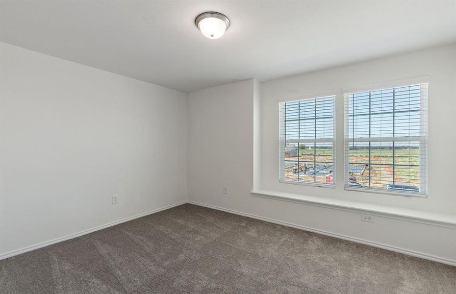 *Model representation. Some features and options may differ - Spacious secondary bedroom with large windows
