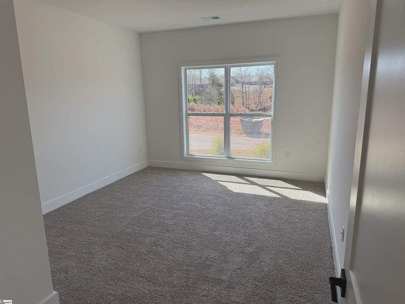 Spacious, unfurnished interior of a new home in Hidden Lake Estates, Greenville (Image 18). Spacious, unfurnished interior of a new home in Hidden Lake Estates, Greenville (Image 18).