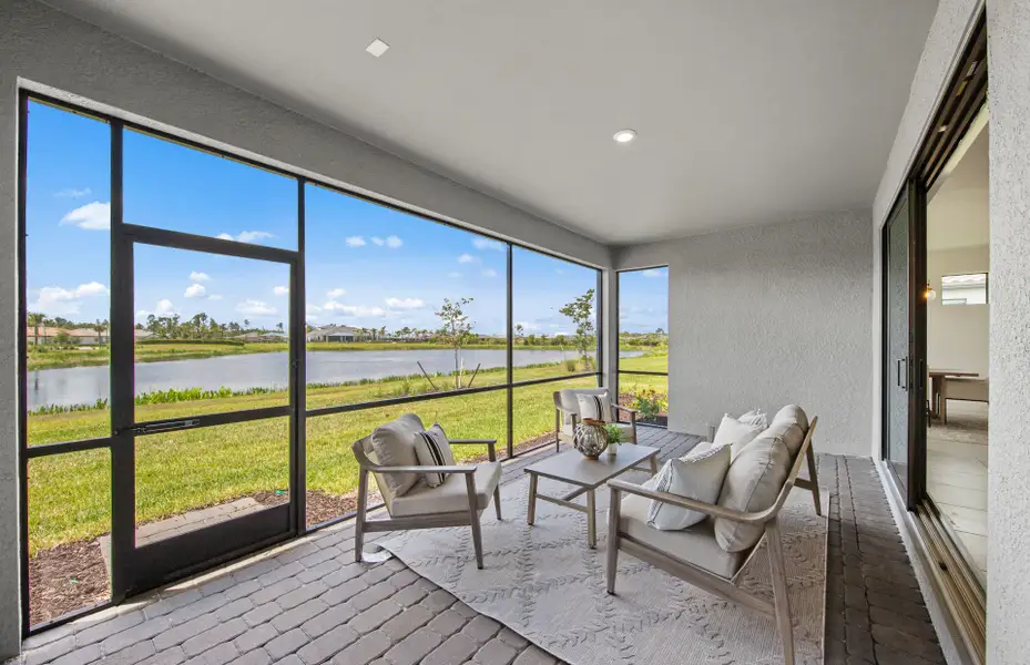 Exterior details and patio area of a home in Arbor Oaks, North Port (Image 3).
