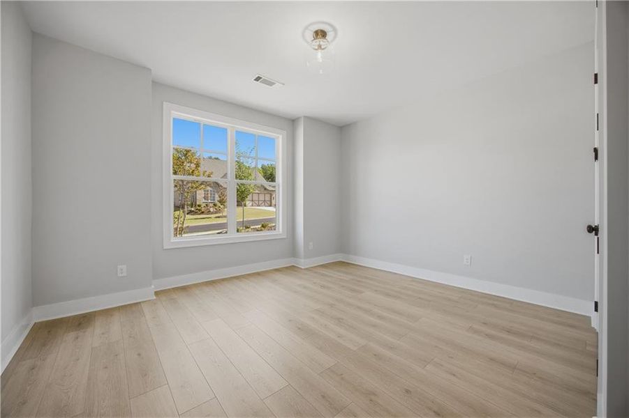 Spacious, unfurnished interior of a new home in Yellowstone Farms, Cumming (Image 21).