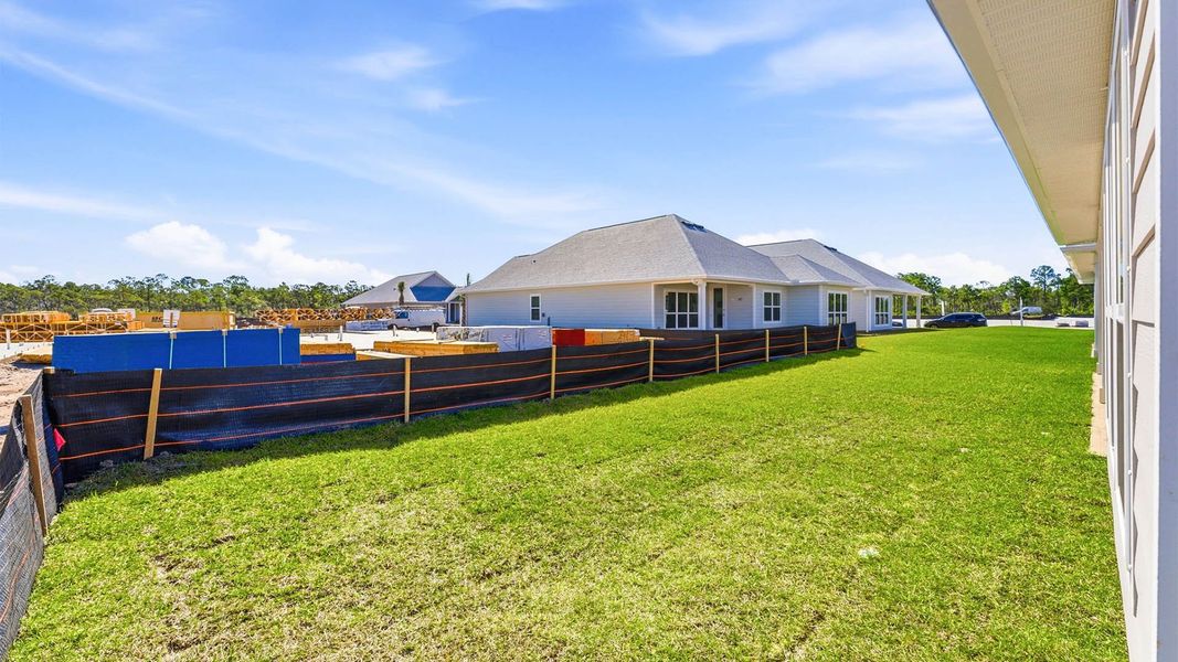 Exterior details and patio area of a home in WindMark Beach, Port Saint Joe (Image 20).
