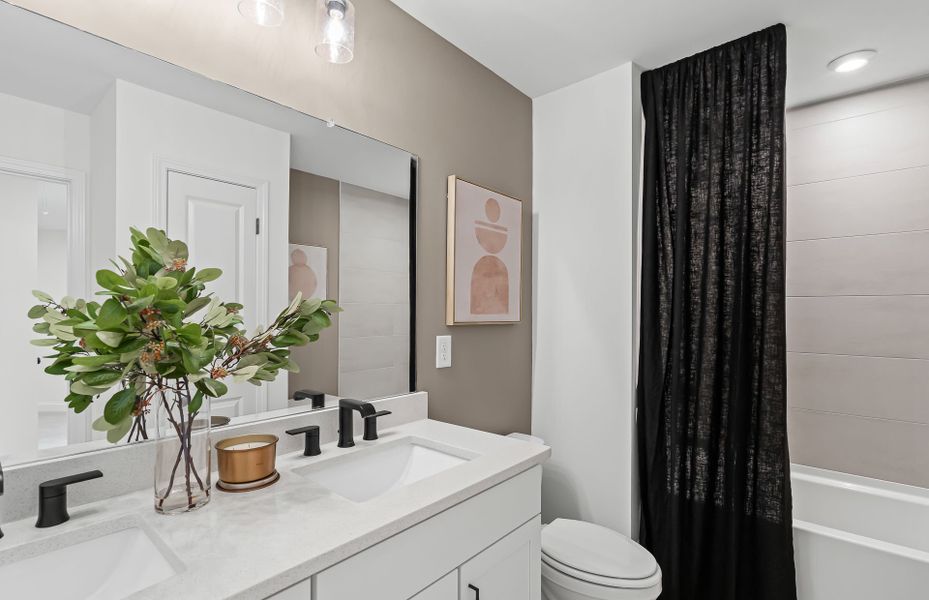 Representative furnished interior of a home built from the Continental by Pulte Homes in Reunion, Flowery Branch (Image 38).