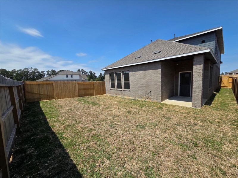 Exterior details and patio area of a home in Emory Glen, Magnolia (Image 4).