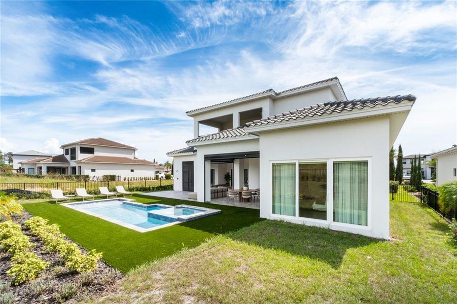 Exterior details and patio area of a home in Bella Collina, Montverde (Image 20).
